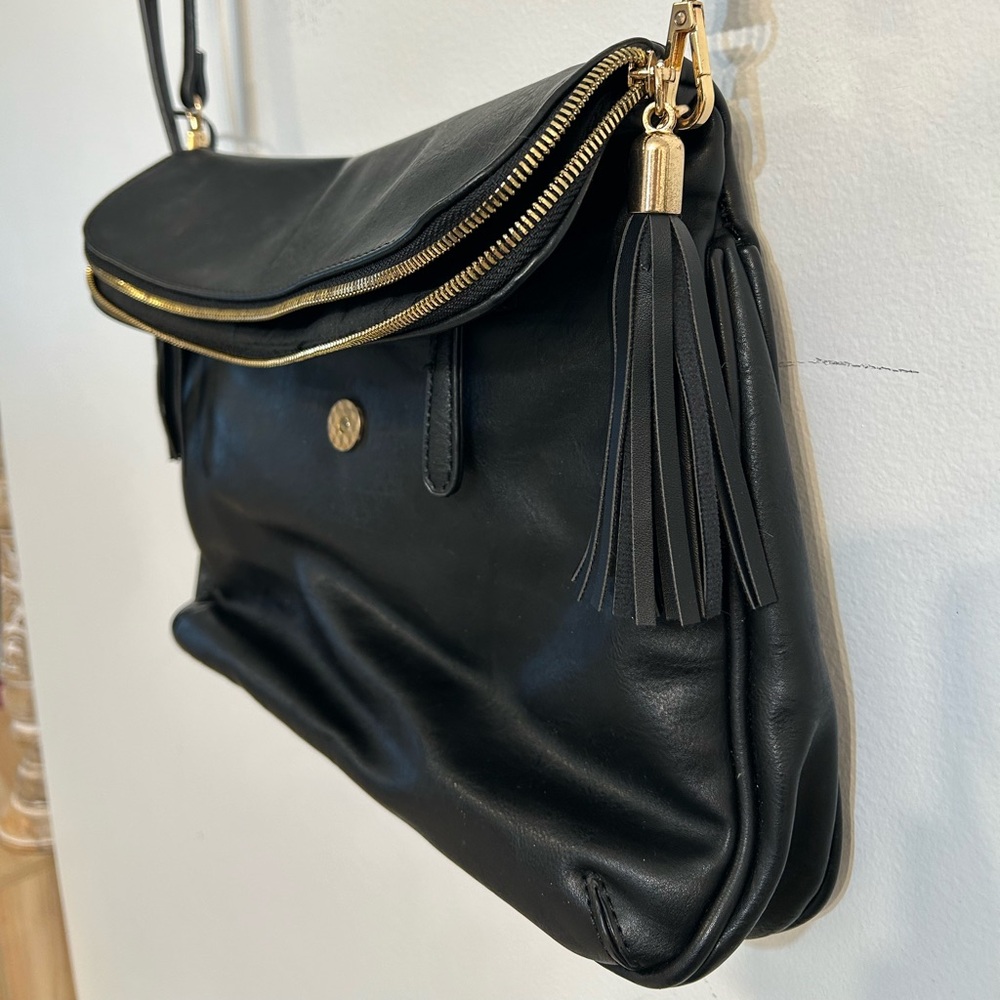 Sleek Black Crossbody Bag with Tassel Details large bag